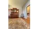 The living room includes hardwood floors, a decorative rug, and a large wood china cabinet at 8508 Colgate Cir, Charlotte, NC 28214