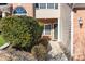 Inviting townhome entrance with a well-manicured garden and a clear view of the front door at 8583 Carolina Lily Ln, Charlotte, NC 28262