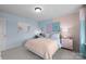 Inviting bedroom featuring a writing desk, chair, and two-tone blue and pink walls at 889 Regulus Ct, York, SC 29745