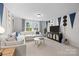 Comfortable living room with a large sectional sofa and a stylish entertainment center at 889 Regulus Ct, York, SC 29745