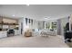 Comfortable living room with a large sectional sofa and a unique wall design at 889 Regulus Ct, York, SC 29745