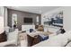 Inviting living room featuring stylish decor, comfortable sofas, a modern TV, and an open layout perfect for entertaining at 889 Regulus Ct, York, SC 29745