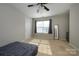 This bedroom features carpet, ceiling fan, natural light, and plenty of room to unwind at 9031 Pembroke Ct, Indian Land, SC 29707