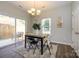 Bright dining area with sliding glass doors leading to an outdoor patio and backyard at 9031 Pembroke Ct, Indian Land, SC 29707
