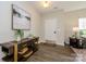 Bright foyer with modern console table, stylish decor, and hardwood floors at 9031 Pembroke Ct, Indian Land, SC 29707