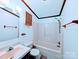 Bathroom with a shower/tub combo, updated vanity, toilet, mirror, and fixtures at 9404 Mini Ranch Rd, Waxhaw, NC 28173