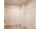 Walk-in closet with wire shelving to help with storage and organization at 10036 Paper Birch Dr, Charlotte, NC 28215