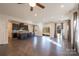 Bright and open living area featuring dark hardwood floors, recessed lighting, and large sliding doors at 10036 Paper Birch Dr, Charlotte, NC 28215