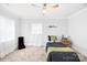 Comfortable bedroom with a window, a bed, a small wood nightstand and comfortable gray carpet at 1075 Wellman St, Gastonia, NC 28054