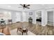Comfortable living room featuring light gray walls and wood-look floors at 1075 Wellman St, Gastonia, NC 28054