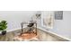 Bright office area features a desk, comfortable chair, wood floors, and a 'Follow Your Dreams' decoration at 1075 Wellman St, Gastonia, NC 28054