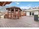Backyard featuring a gazebo with a fan on a wooden deck for outdoor relaxation at 111 Bethpage Rd, Kannapolis, NC 28081