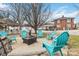 Bright backyard including outdoor seating around a fire pit and a gazebo at 111 Bethpage Rd, Kannapolis, NC 28081
