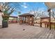Backyard with a large wooden deck and a gazebo for outdoor entertainment at 111 Bethpage Rd, Kannapolis, NC 28081