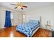 Bedroom with a ceiling fan, hardwood floors, and natural light from the window at 111 Bethpage Rd, Kannapolis, NC 28081