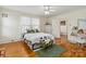 Comfortable bedroom featuring neutral tones, hardwood floors, and a ceiling fan at 111 Bethpage Rd, Kannapolis, NC 28081