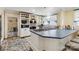 Unique kitchen with a tile countertop, ample storage, and stainless-steel appliances at 111 Bethpage Rd, Kannapolis, NC 28081