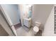 Bathroom featuring tile flooring, toilet, vanity with sink, and modern fixtures at 1116 Kenly St, Salisbury, NC 28144