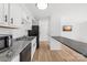 Modern kitchen with stainless steel appliances and granite countertops at 1641 Arlyn Cir # A, Charlotte, NC 28213