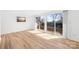Living room with patio access via sliding glass doors at 1641 Arlyn Cir # A, Charlotte, NC 28213