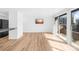 Living room with view of patio through sliding glass doors at 1641 Arlyn Cir # A, Charlotte, NC 28213