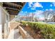 Cozy patio area featuring a brick retaining wall and lush greenery, ideal for relaxation and outdoor enjoyment at 1641 Arlyn Cir # A, Charlotte, NC 28213
