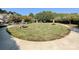 Spacious common area with picnic tables, umbrellas, and manicured landscaping at 17137 Red Feather Dr, Charlotte, NC 28277