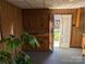 Open living space featuring natural light, classic cabinets, and an open doorway at 1807 Brantley Rd, Kannapolis, NC 28083