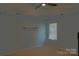 Light blue bedroom featuring a ceiling fan and window, providing a bright and airy feel at 2043 Covered Bridge Ct, Rock Hill, SC 29732