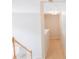 Hallway highlighting stairs to lower level and a decorative light fixture at 2043 Covered Bridge Ct, Rock Hill, SC 29732