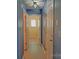 Hallway with laminate flooring and blue painted walls at 2043 Covered Bridge Ct, Rock Hill, SC 29732