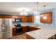 Updated kitchen with stainless appliances, granite counters, and wood cabinets at 2043 Covered Bridge Ct, Rock Hill, SC 29732