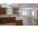 Updated kitchen with granite counters, stainless dishwasher and dark wood cabinets at 2043 Covered Bridge Ct, Rock Hill, SC 29732