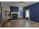 Spacious living room features fireplace, wood flooring, and natural light at 2043 Covered Bridge Ct, Rock Hill, SC 29732