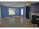 Living room showcases hardwood flooring, natural light, and a modern lighting fixture at 2043 Covered Bridge Ct, Rock Hill, SC 29732