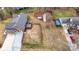 Aerial view of the backyard with a detached garage and shed at 4065 Lost Creek Ct, Hickory, NC 28602