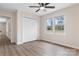 Bedroom featuring closet, wood floor, neutral walls, and large window at 4065 Lost Creek Ct, Hickory, NC 28602