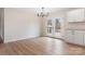 Bright dining area with doors leading to a deck and light-colored walls and flooring at 4065 Lost Creek Ct, Hickory, NC 28602
