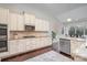 Gourmet kitchen with stainless steel appliances, granite countertops, and ample cabinet space, perfect for cooking at 4131 Nottaway Place Dr, Matthews, NC 28105