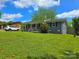 Well-kept home exterior with a lush lawn and inviting curb appeal on a sunny day at 4930 Crestmont Dr, Charlotte, NC 28205