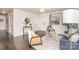 Bright living room with hardwood floors, modern furnishings, and plenty of natural light at 4930 Crestmont Dr, Charlotte, NC 28205
