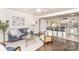 Cozy living area open to the kitchen, featuring modern decor and an inviting atmosphere at 4930 Crestmont Dr, Charlotte, NC 28205