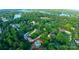 An aerial shot highlighting a home with a private pool in a lakeside community at 6108 Gold Creek Estate Dr, Hickory, NC 28601
