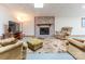 Finished basement with a fireplace, comfortable seating, and large rug at 6108 Gold Creek Estate Dr, Hickory, NC 28601