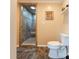 Modern bathroom featuring a tiled walk-in shower with a built-in bench and decorative accents at 6108 Gold Creek Estate Dr, Hickory, NC 28601