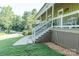View of the house with a inviting front porch and well-manicured lawn at 6108 Gold Creek Estate Dr, Hickory, NC 28601
