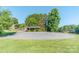 Large parking area with a covered picnic area and trees at 6108 Gold Creek Estate Dr, Hickory, NC 28601