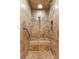 Walk-in shower with a built-in seat, tiled walls, and a shower head at 6108 Gold Creek Estate Dr, Hickory, NC 28601