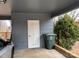 Covered carport with ample space for parking and storage, featuring a convenient side entry door at 818 W 6Th St, Newton, NC 28658