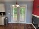 Bright dining room features a modern chandelier and door to the backyard at 823 Prestwick Dr, Rock Hill, SC 29730